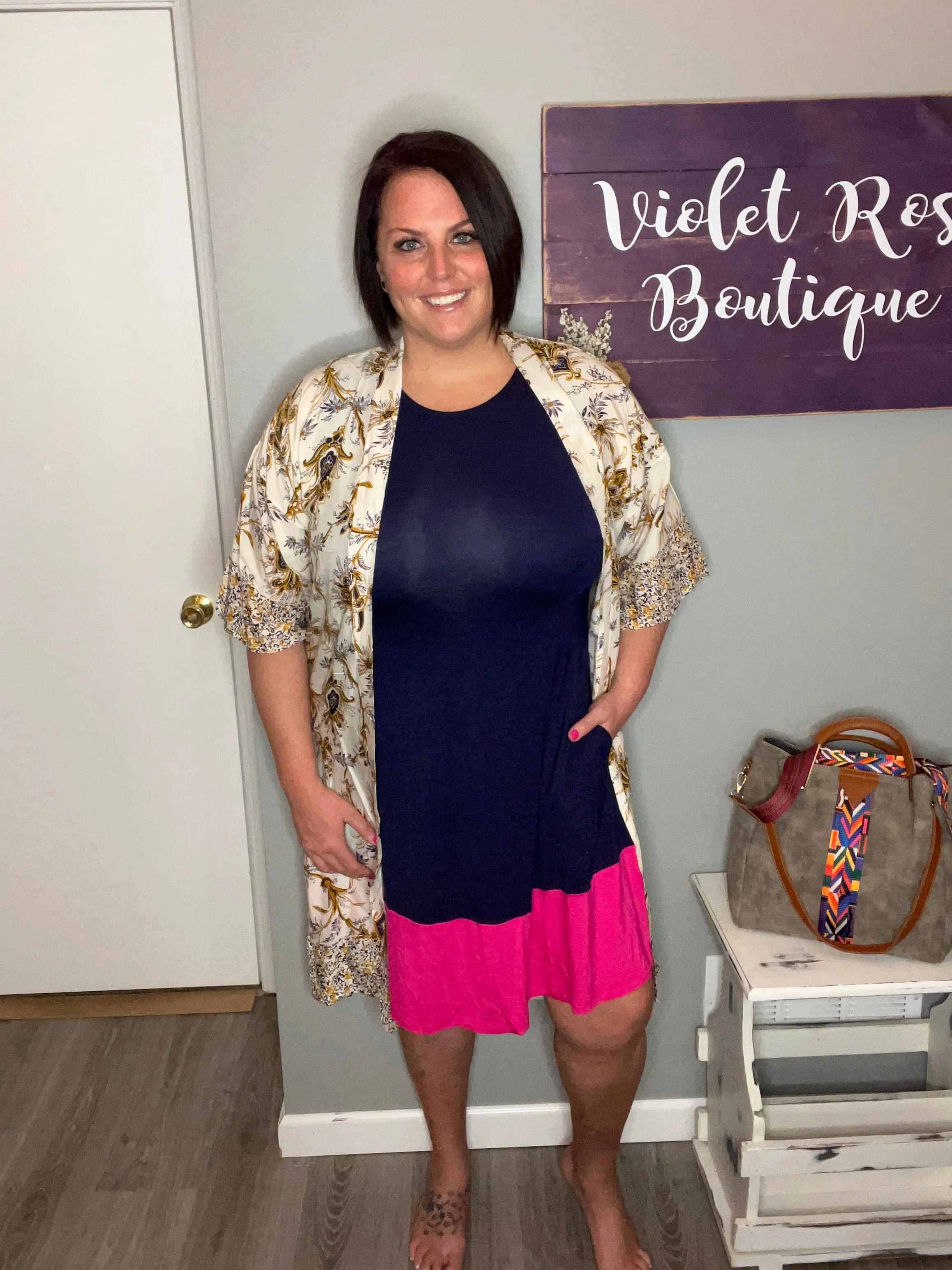 Yelete Full Size Two-Tone Sleeveless Mini Dress with Pockets
